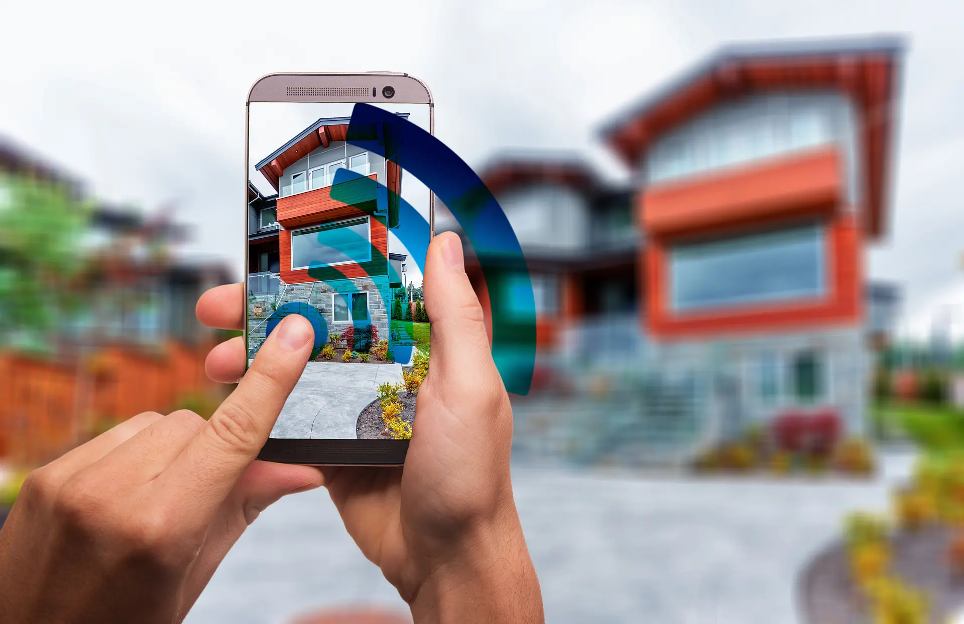 Maison connectée avec smartphone et signal Wi-Fi visible.